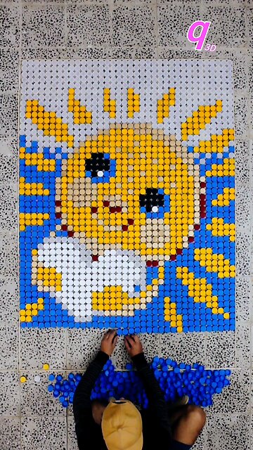 Even the Sun Has a Heart ❤️ Made with 1,872 bottle caps, piece by piece. Can you see the heart? 🤍