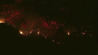 Aerial view of Los Angeles as wildfires burn through the night