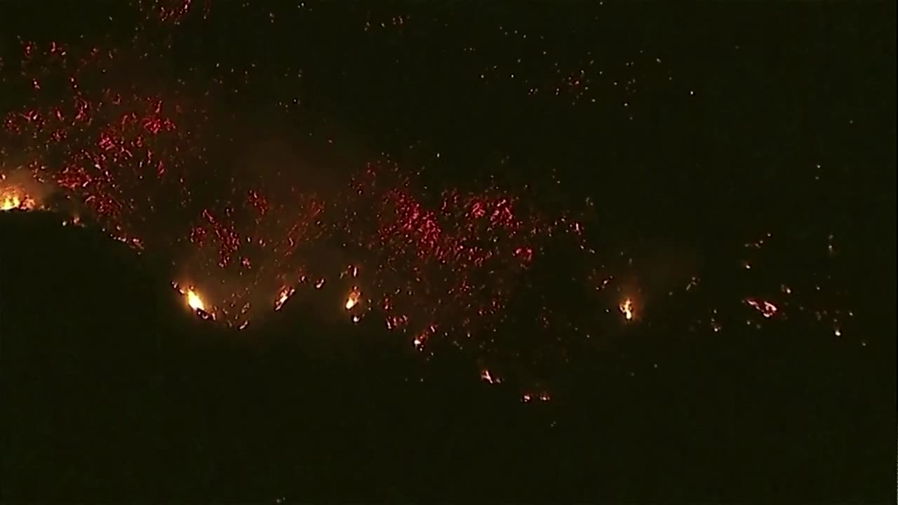 Aerial view of Los Angeles as wildfires burn through the night