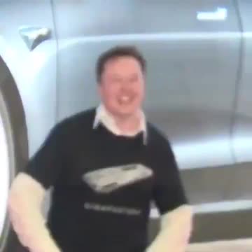 Elon Musk dancing on stage