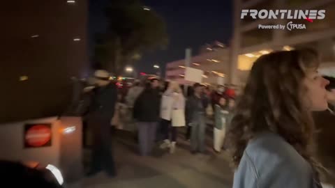 Austin, TX- A man sits in his car blocked in by a wall of anti-ICE protesters | I wonder if they realize they are chanting for the collapse of their own country and for Marxism