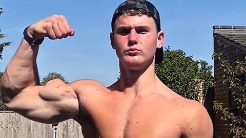 16 years old teen bodybuilder flexing muscles