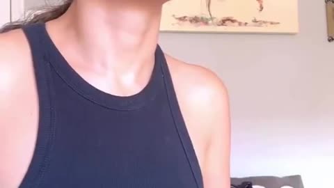 A woman asks AI which "conspiracy theories" are actually true