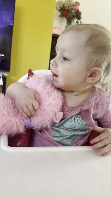 kayla and her toy doggie cute