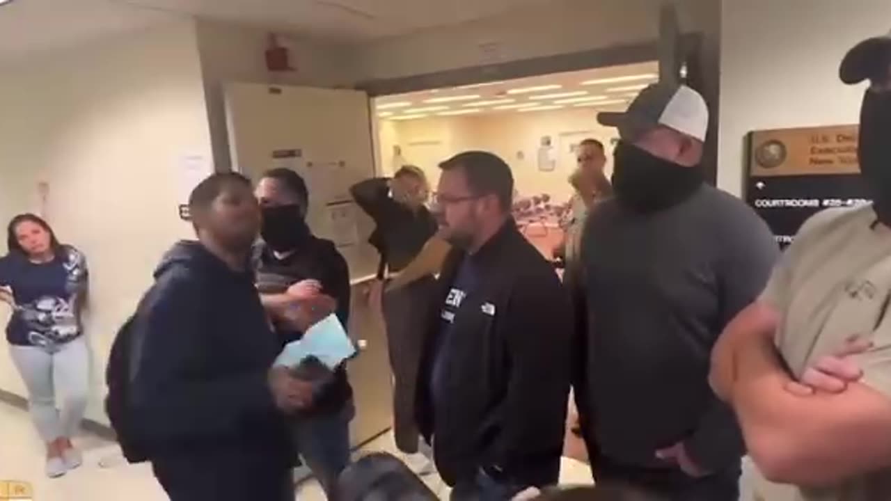 Black Man confronts ICE at court