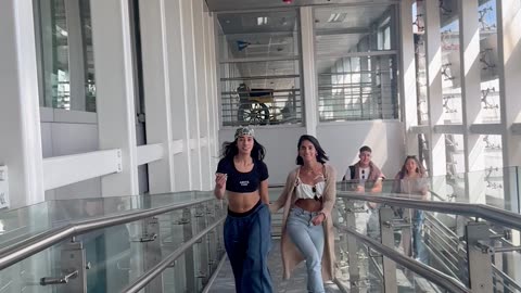 Woman Nearly Gets Pantsed As Friend Trips