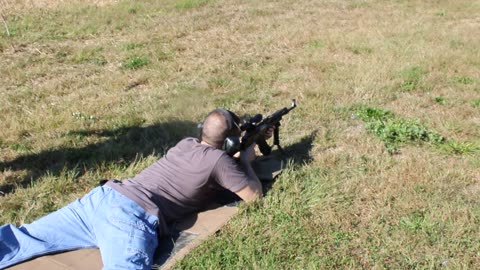 Claudio tries out an AK