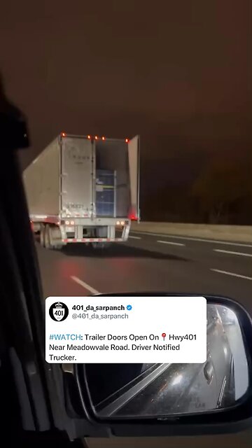Trailer Doors Open On Highway