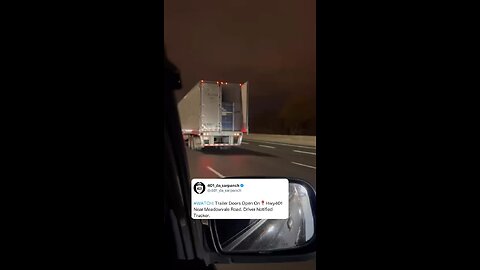 Trailer Doors Open On Highway