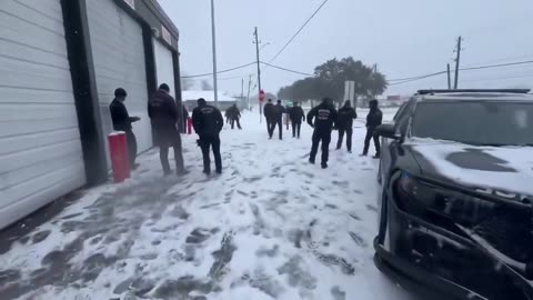 Members of Houston Fire Dept. and Police are having snowball fight in Texas