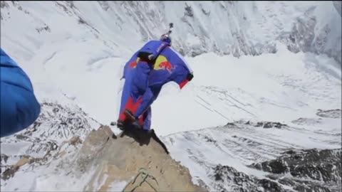 Daredevil jumps off HIGHEST PEAK IN THE WORLD 230,687 Feet atop Mt. Everest