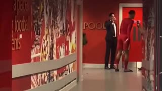 Virgil van Dijk has a post-game talk with Al-Khelaifi and Luis Campos at Anfield