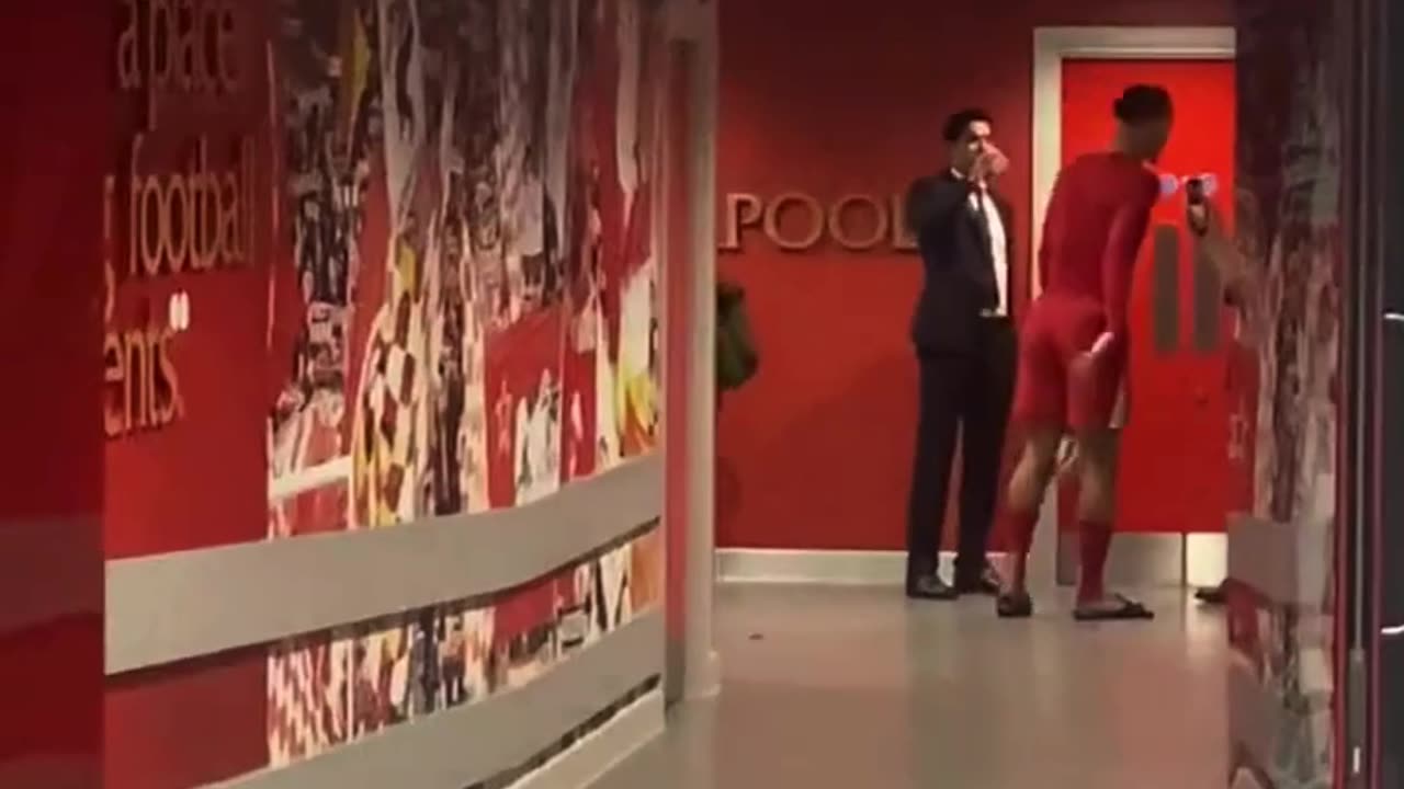 Virgil van Dijk has a post-game talk with Al-Khelaifi and Luis Campos at Anfield