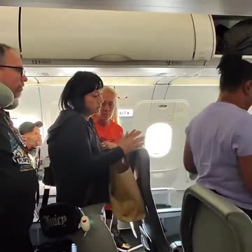 A sheboon refuses to let an entire airplane full of passengers exit
