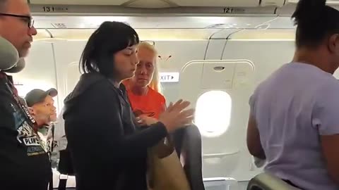A sheboon refuses to let an entire airplane full of passengers exit