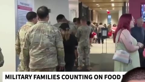 A FOOD BANK LINED UP with MILITARY MEMBERS who DIDN'T RECEIVE a PAYCHECK