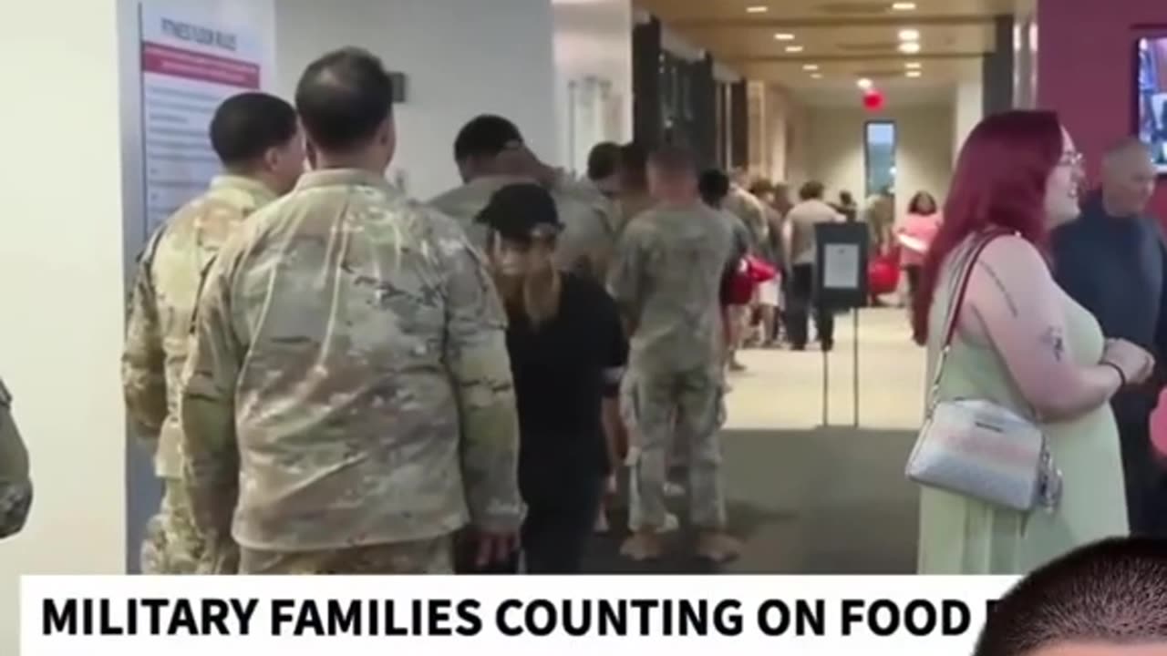 A FOOD BANK LINED UP with MILITARY MEMBERS who DIDN'T RECEIVE a PAYCHECK