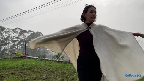 Wetlook girl near the volcano as in rain
