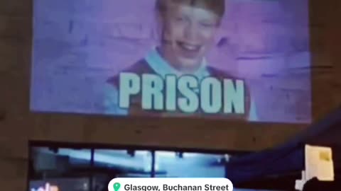 Scottish patriots project a meme mocking two-tier Keir onto a wall in Buchanan