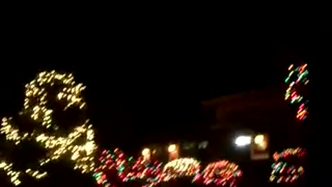 Dale going around the trash cans and filming moreXmas lights, oh, and those nice trash cans too!