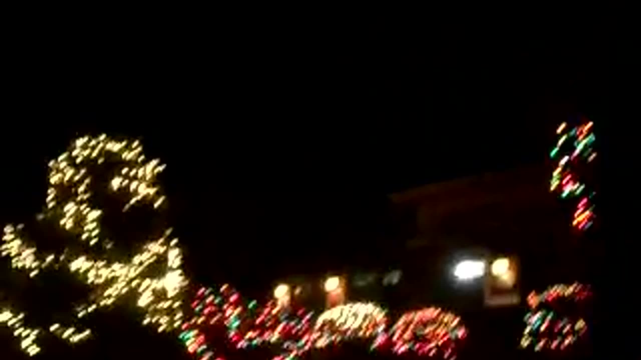 Dale going around the trash cans and filming moreXmas lights, oh, and those nice trash cans too!