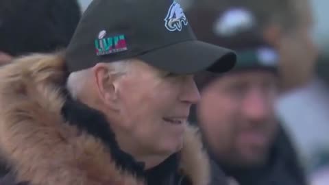 Former President Joe Biden rocking an Eagles hat on sideline