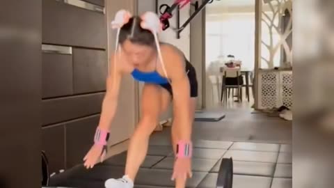 The girl who works out at the gym is extremely good and attractive.