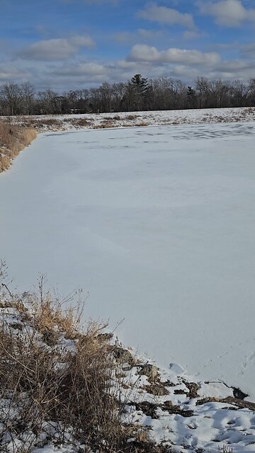 Frozen Green Lake Covered in Snow