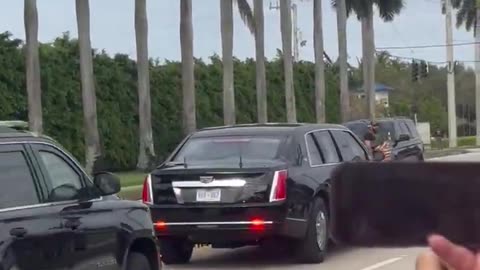 President Donald J. Trump waves to supporters as he leaves Mar-a-Lago on President's Day