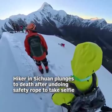 Hiker disconnects safety line for a SELFIE on a mountain top, slides off