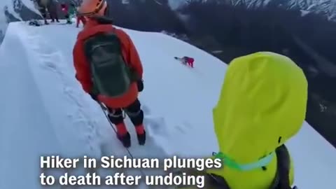 Hiker disconnects safety line for a SELFIE on a mountain top, slides off
