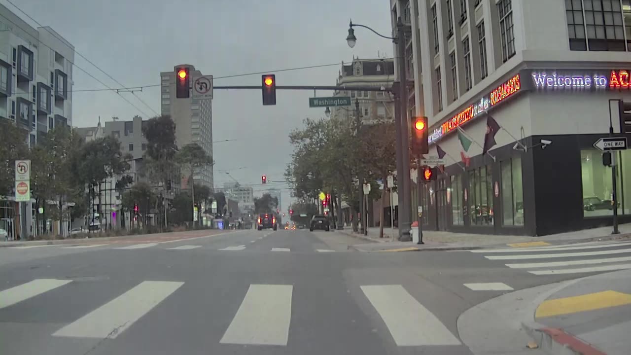 Car Runs Redlight and Has a Close Call With Crossing Pedestrian