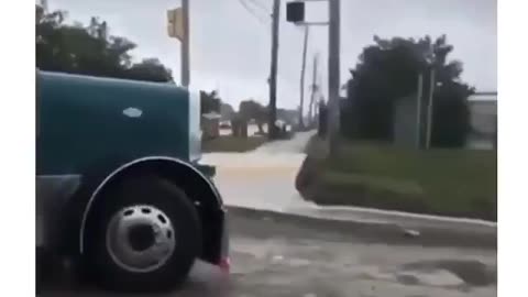 “Truck Driver Ignores Protesters and Drives Through!”