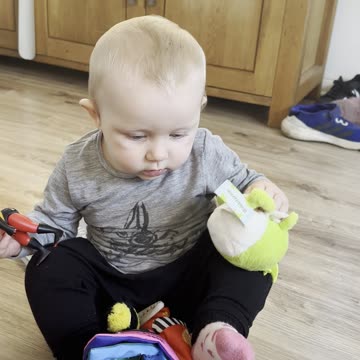 Three toys, one baby, endless cuteness 😄