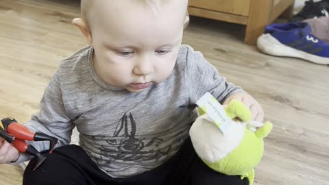 Three toys, one baby, endless cuteness 😄