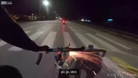 Cyclist launches fireworks at scooter couple - Italy