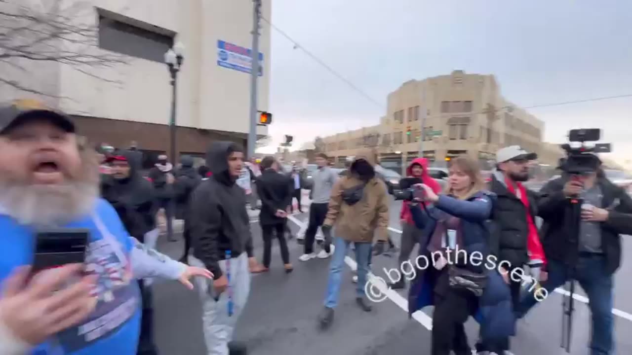 Muslims show their violent nature when Jake Lang slapped bacon all over a Quran