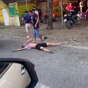 Guy gets his head busted with a stone slab