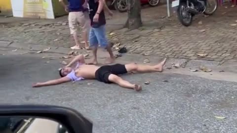 Guy gets his head busted with a stone slab