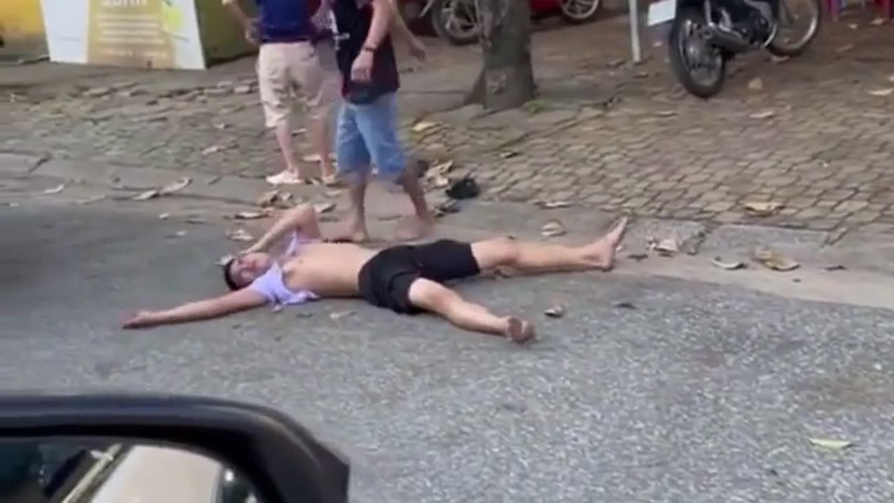 Guy gets his head busted with a stone slab