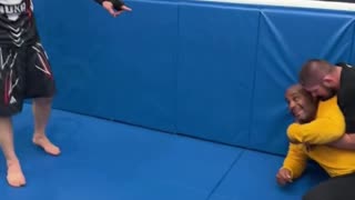 Islam Makhachev Trolls Daniel Cormier While Khabib Holds Him Down