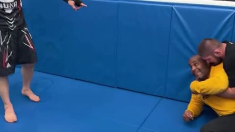 Islam Makhachev Trolls Daniel Cormier While Khabib Holds Him Down