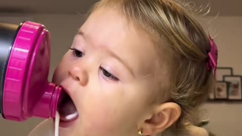 Little Daughter Trying Vanilla Shake