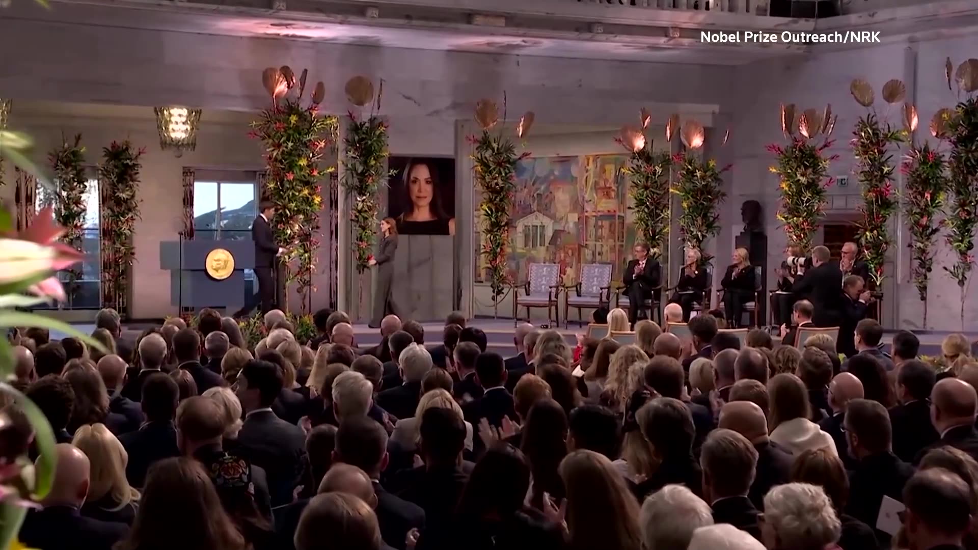 Daughter of Nobel Peace Prize winner accepts prize on her behalf