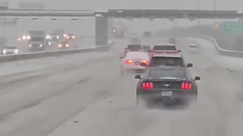 Dallas North Tollway covered in snow