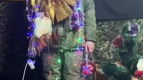 Russian Soldier Stuck with Ukrainians for Christmas Eve Making Himself Useful