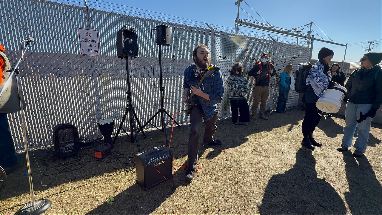 Electric Guitar Player Leads Chants Outside Broadview ICE Facility