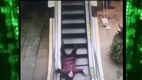 Lady gets a beat down from an escalator