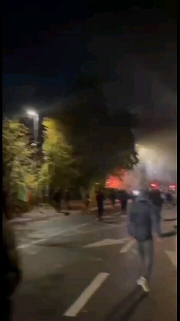 A police car was set on fire for the second consecutive night amid violent clashes in Dublin