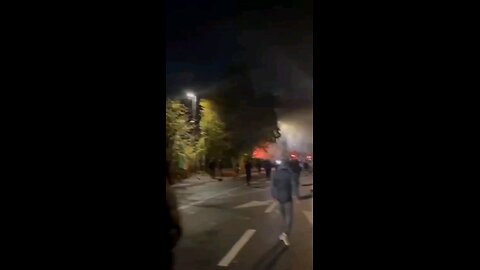 A police car was set on fire for the second consecutive night amid violent clashes in Dublin